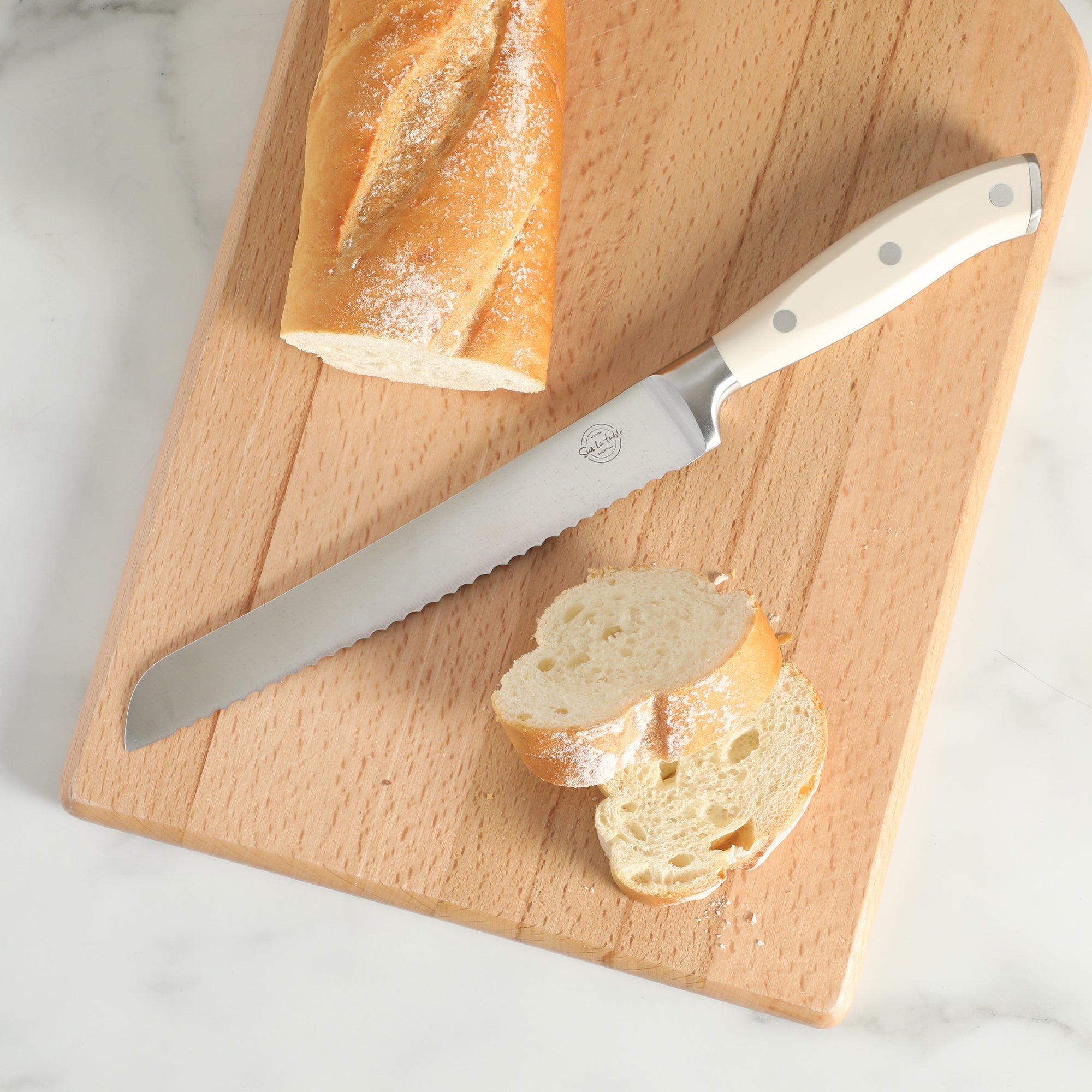 Sur La Table Kitchen Essentials Tasting Kitchen German Steel Bread Knife, 8-Inch Stainless Steel Blade – Professional Kitchen Knife with White Handle and Forged Full Tang