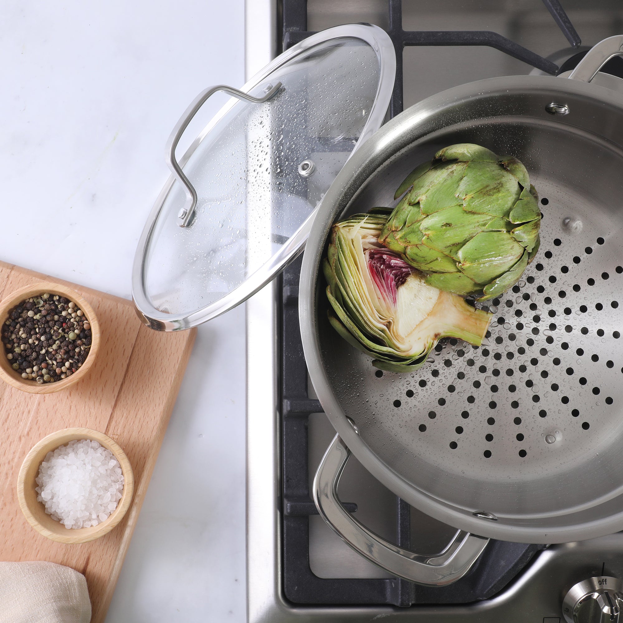 Sur La Table Kitchen Essentials Chef's Deck 3-Piece 5.3-Quart Stainless Steel Dutch Oven with Steamer Insert & Glass Lid – Induction Ready, Tri-Ply Base, Polished Finish & Hollow Stay-Cool Handles