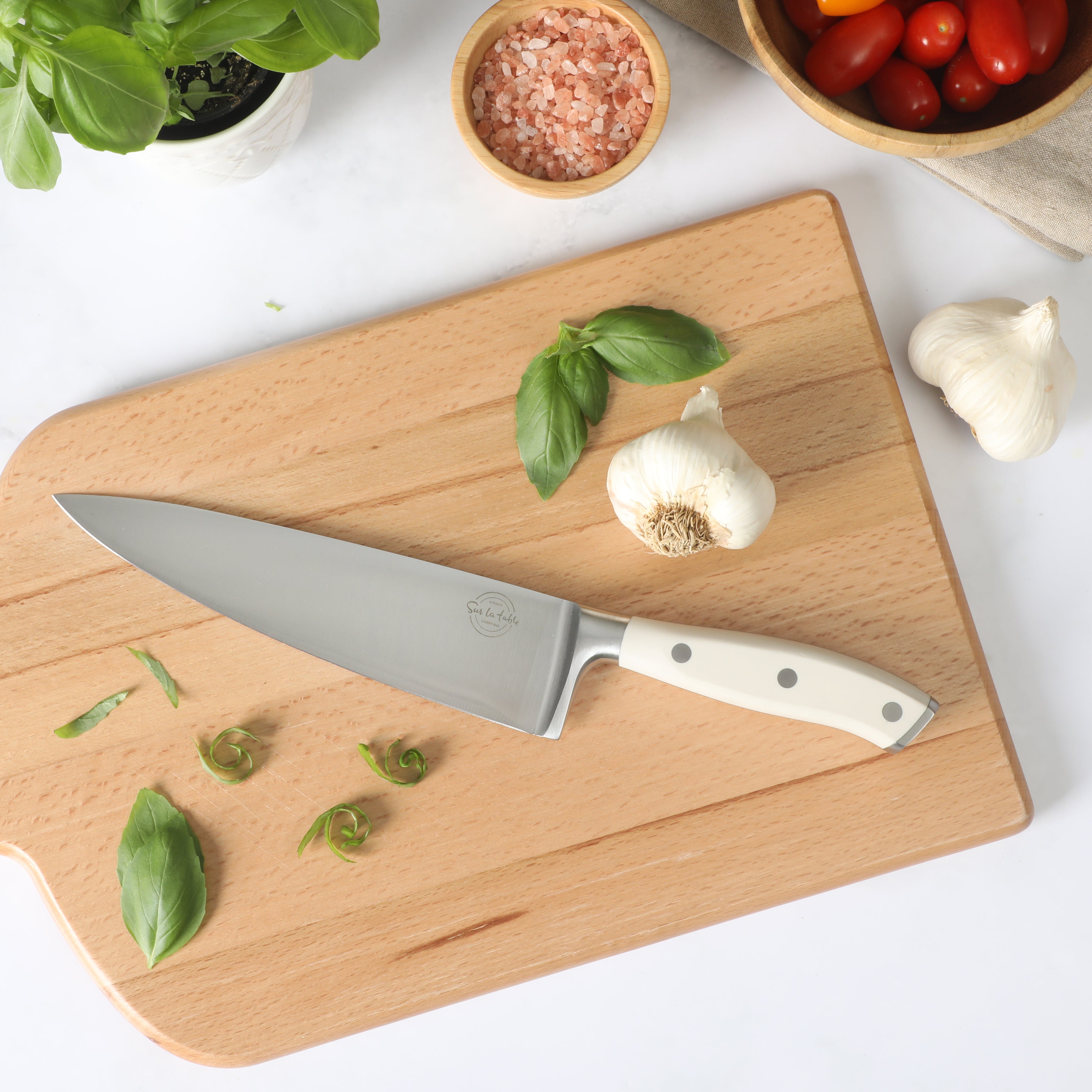 Sur La Table Kitchen Essential German Steel Chef’s Knife, 8-Inch Stainless Steel Blade – Professional Kitchen Knife with Forged Full Tang