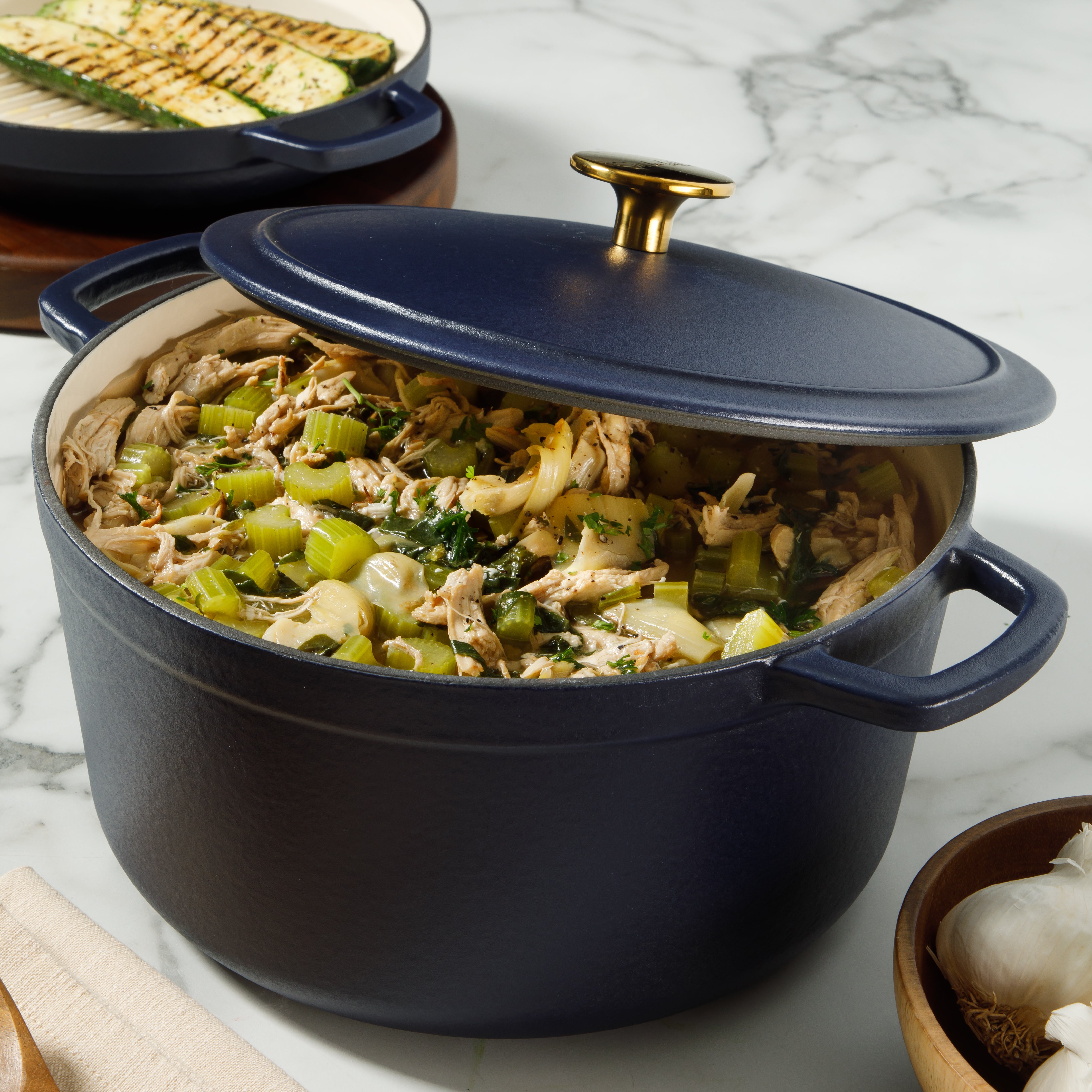 Sur La Table Kitchen Essentials 4-Piece Enameled Cast Iron Stackable Cookware Set, 5.3 Qt Dutch Oven with Lid, Braiser & Grill Pan, Navy Blue, Gold Knob Oven Safe to 500°F, Induction Compatible