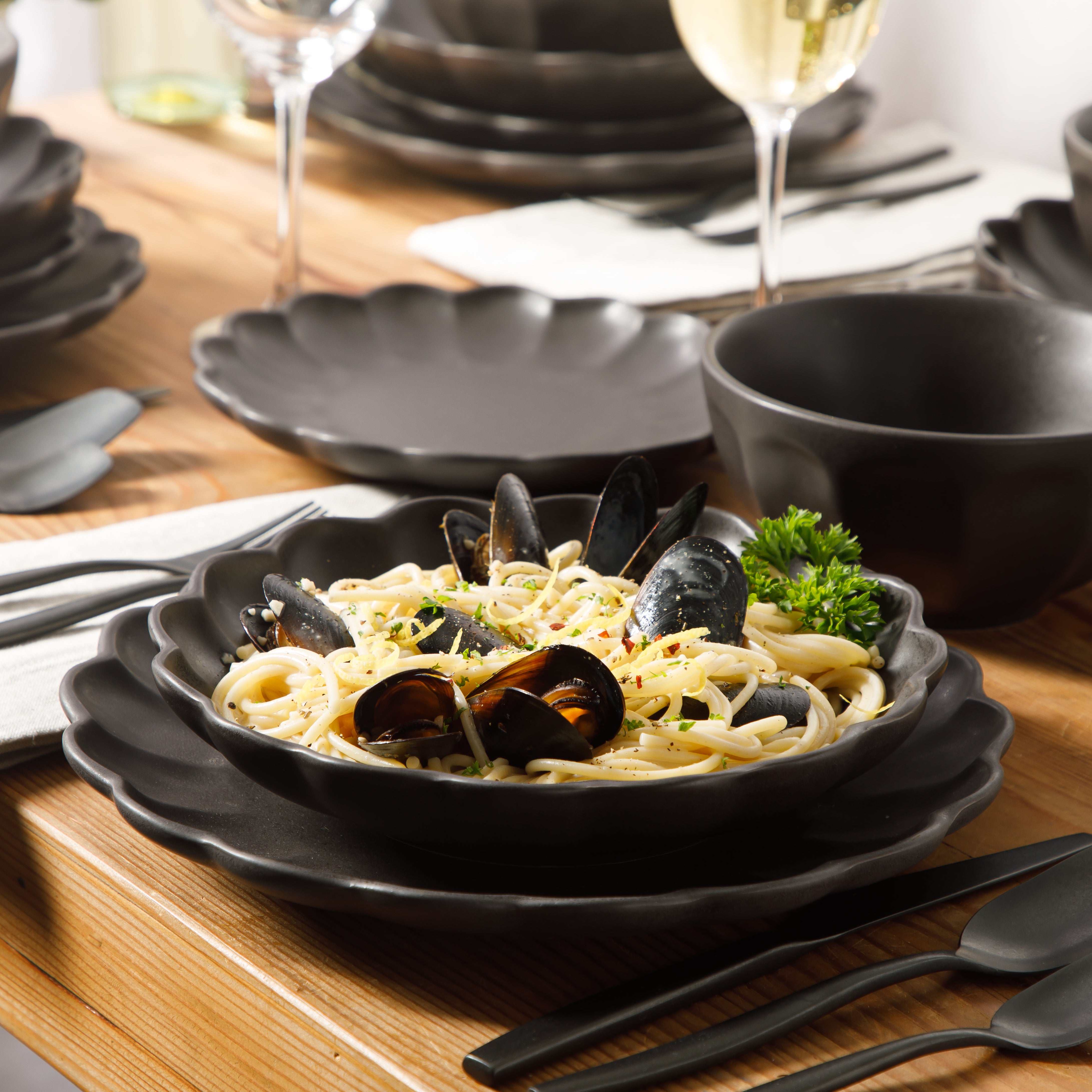 Bloomhouse Plates and Bowls Set, 16 Piece Stoneware Dinnerware for 4, Scallop Embossed, Oprah's Favorite Things, Dishwasher & Microwave Safe, Black