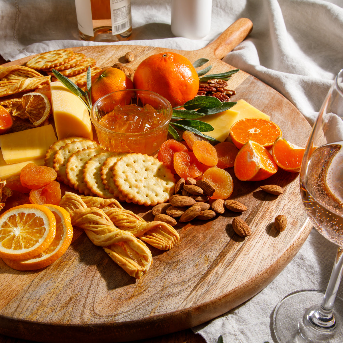 Bloomhouse Mango Wood Round Charcuterie Board with Handle, Serving Board