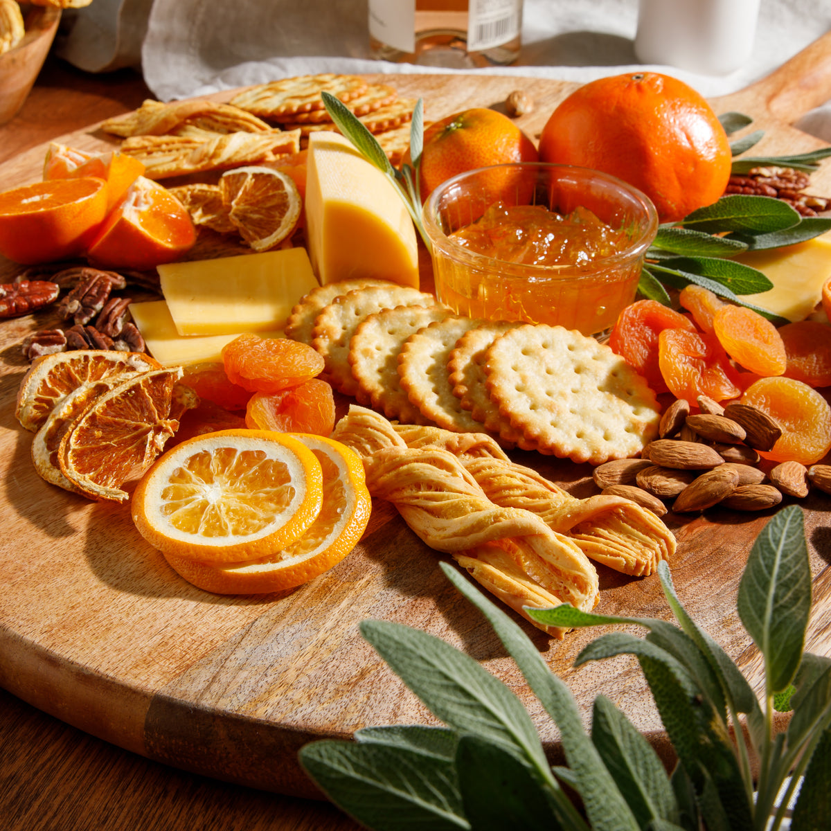 Bloomhouse Mango Wood Round Charcuterie Board with Handle, Serving Board
