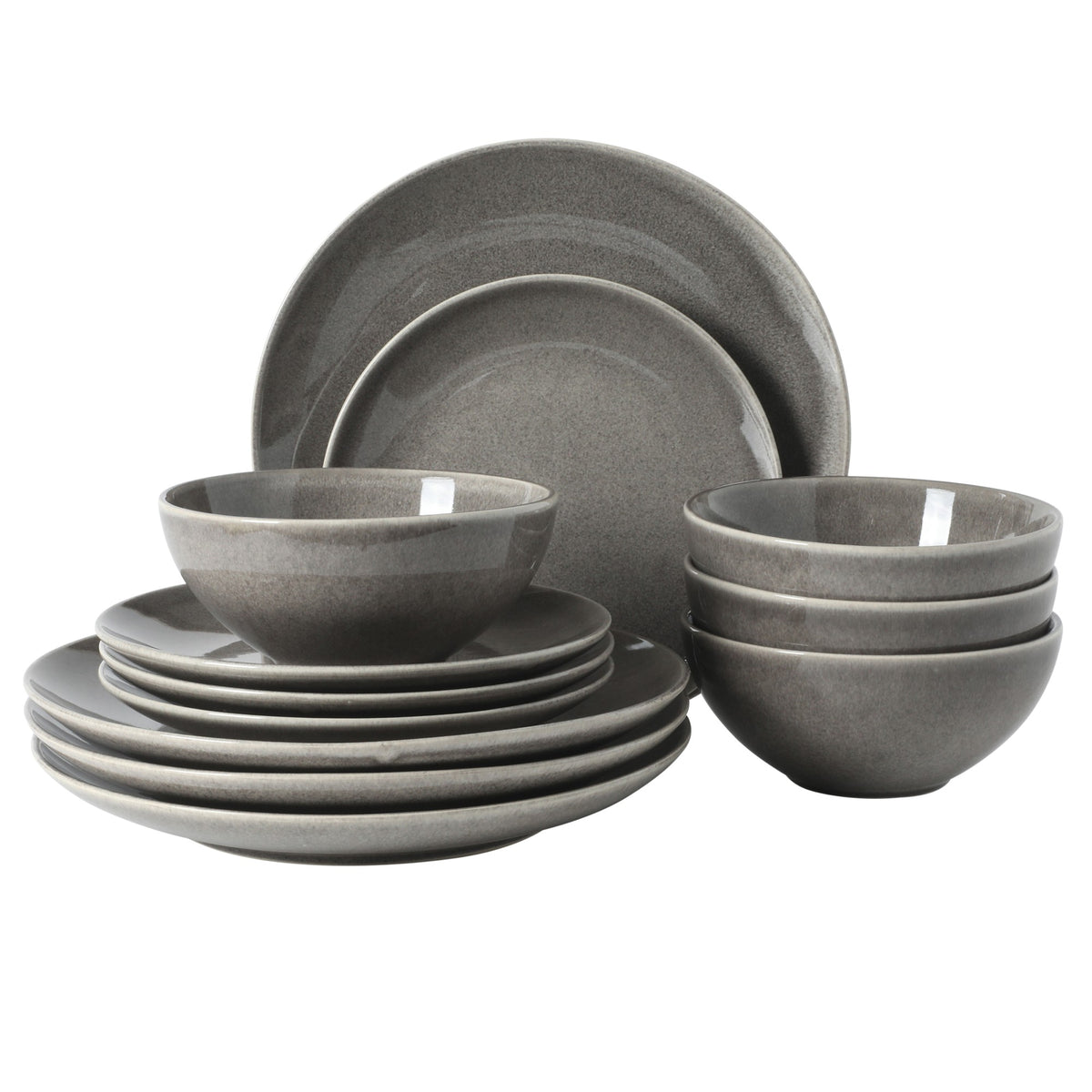 Gibson Elite Castle Peak 12-piece stoneware dinnerware set in a solid grey reactive glaze with an organic, irregular edge, including dinner plates, salad plates, and cereal bowls.