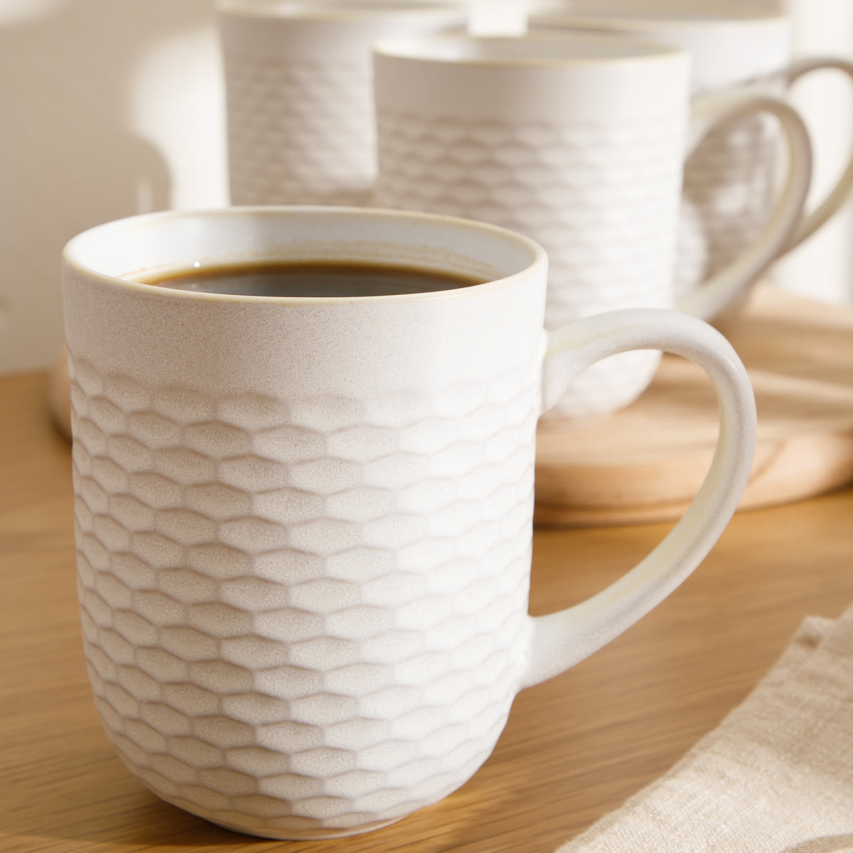 Gibson Home Vail Peaks 4-Piece 16 Oz Stoneware Coffee Mug Set, Cream Braided Embossed Mugs