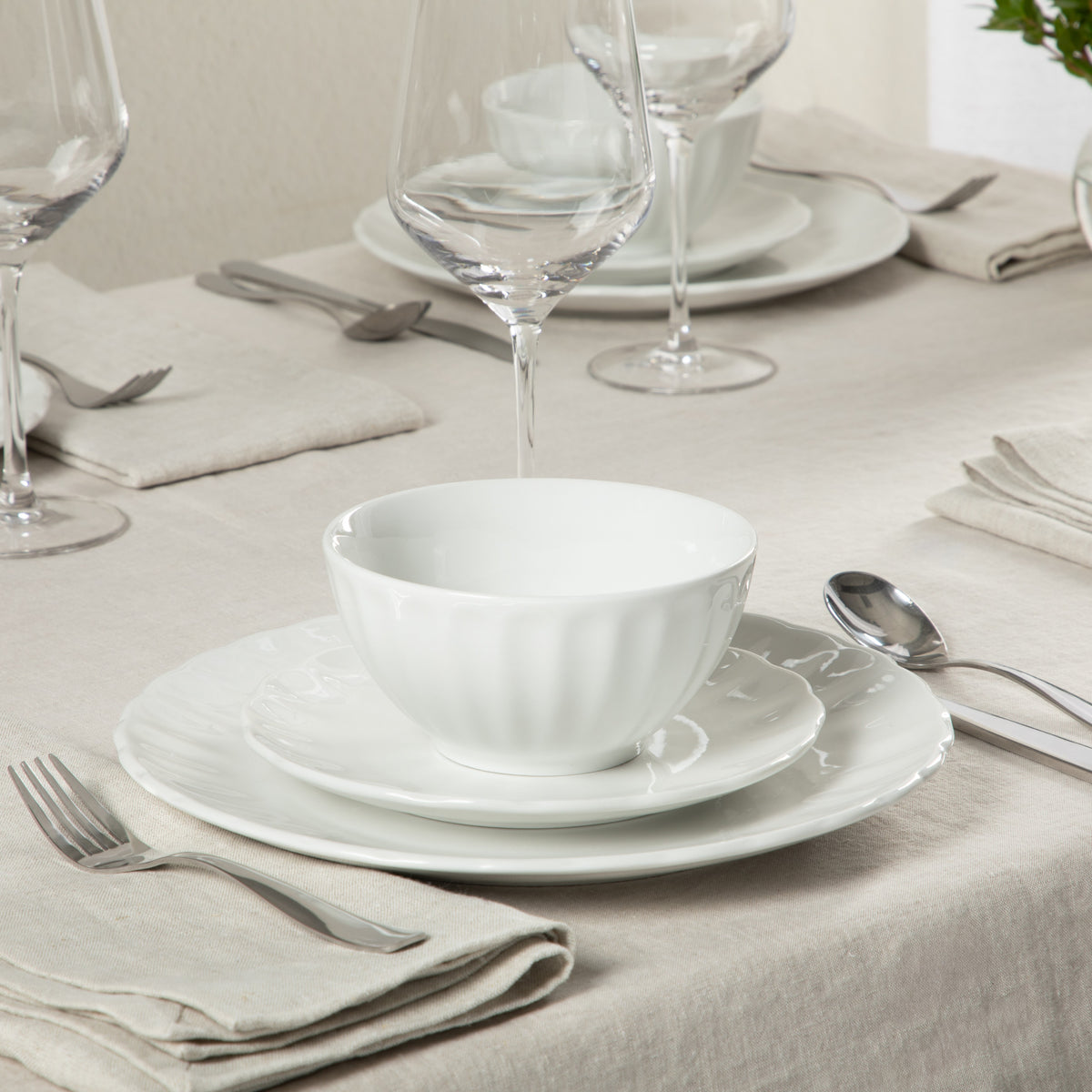 Gibson Home Polar Palisades Plates and Bowls Set, 12 Piece Ceramic Dinnerware Set for 4, Embossed Scallop Design, Dishwasher & Microwave Safe, White